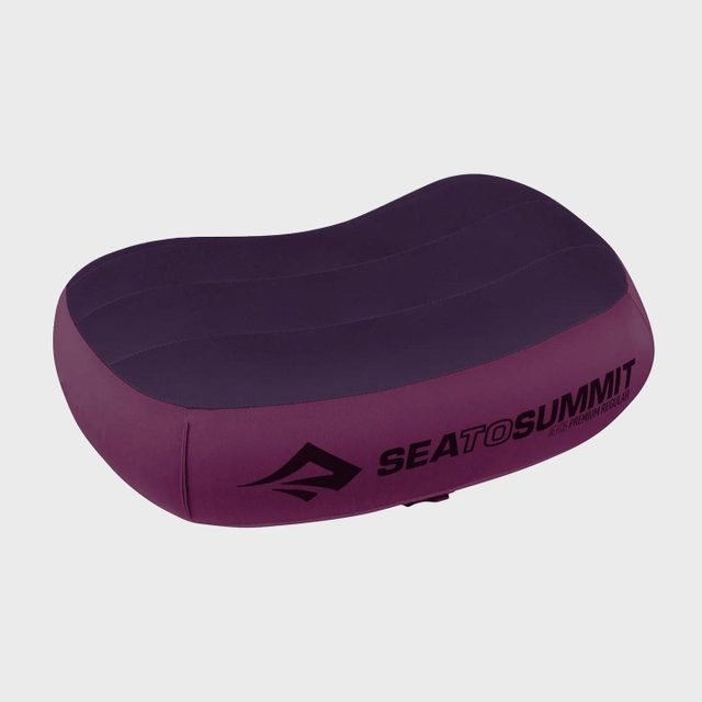 Inflatable pillow resting on a white background, featuring the brand 