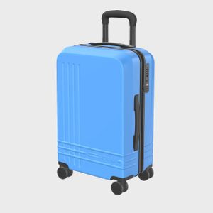 Blue suitcase stands upright, featuring four black wheels, a top handle, and a visible combination lock on the side, against a plain background.