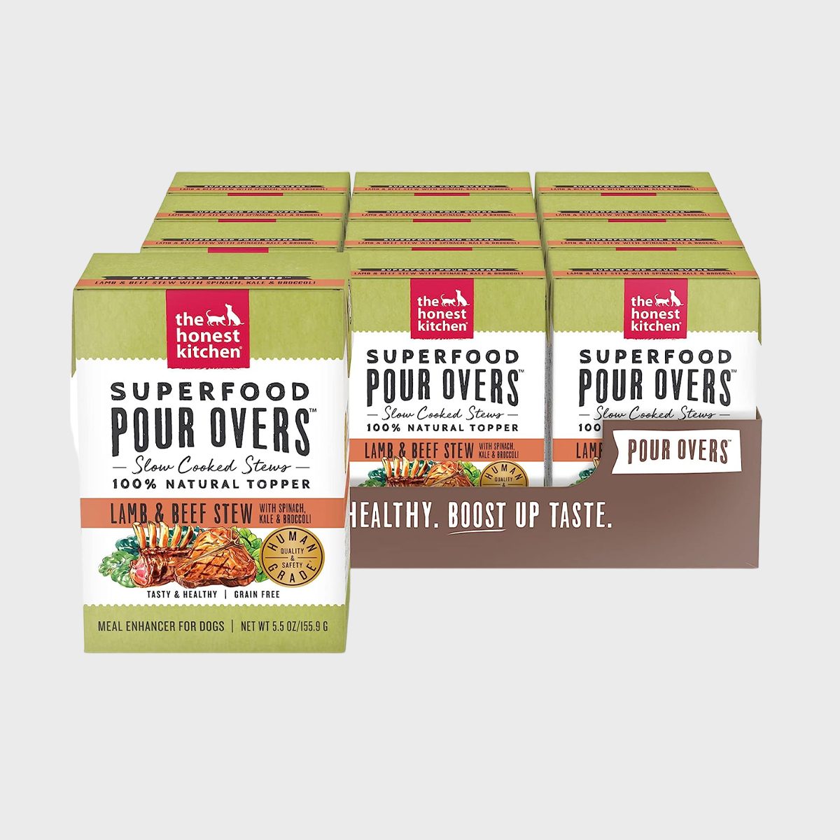 Boxes display dog food toppers with lamb and beef stew, arranged neatly, featuring branding "The Honest Kitchen." Promotes healthy, natural meal enhancement.