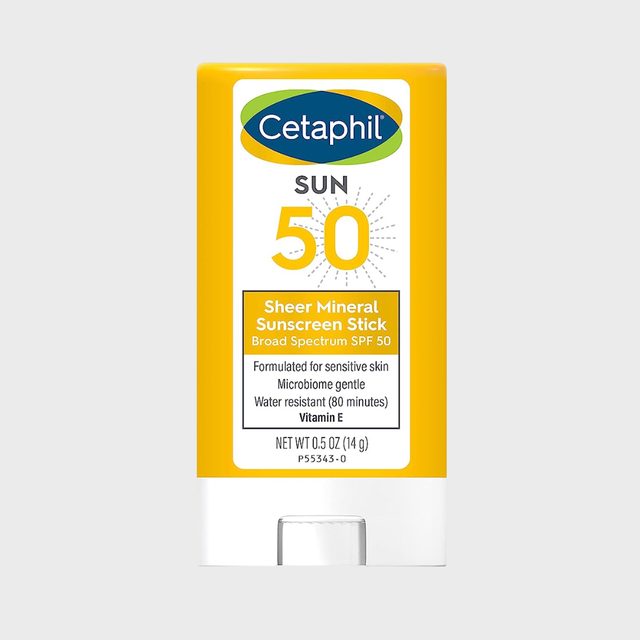 Sunscreen stick labeled Cetaphil SPF 50 with yellow packaging on a light gray background, highlighting water resistance and skin sensitivity features.