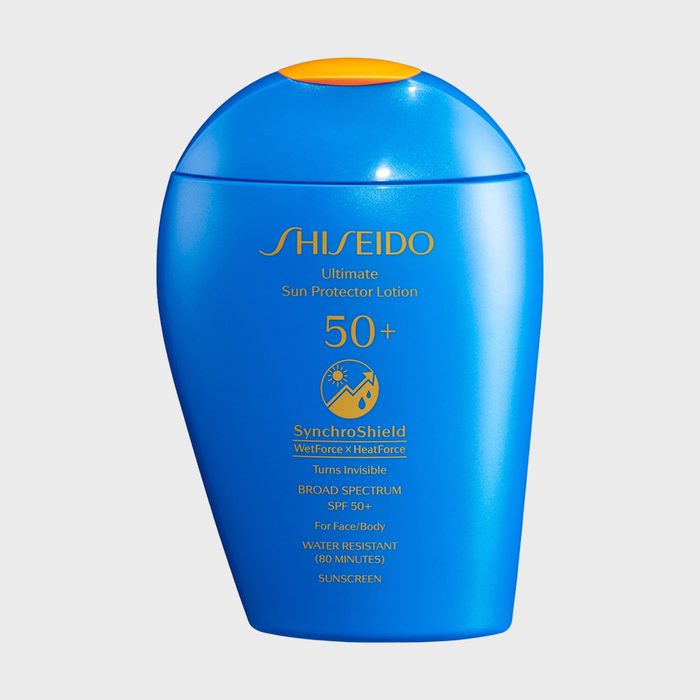 A blue sunscreen bottle displays 