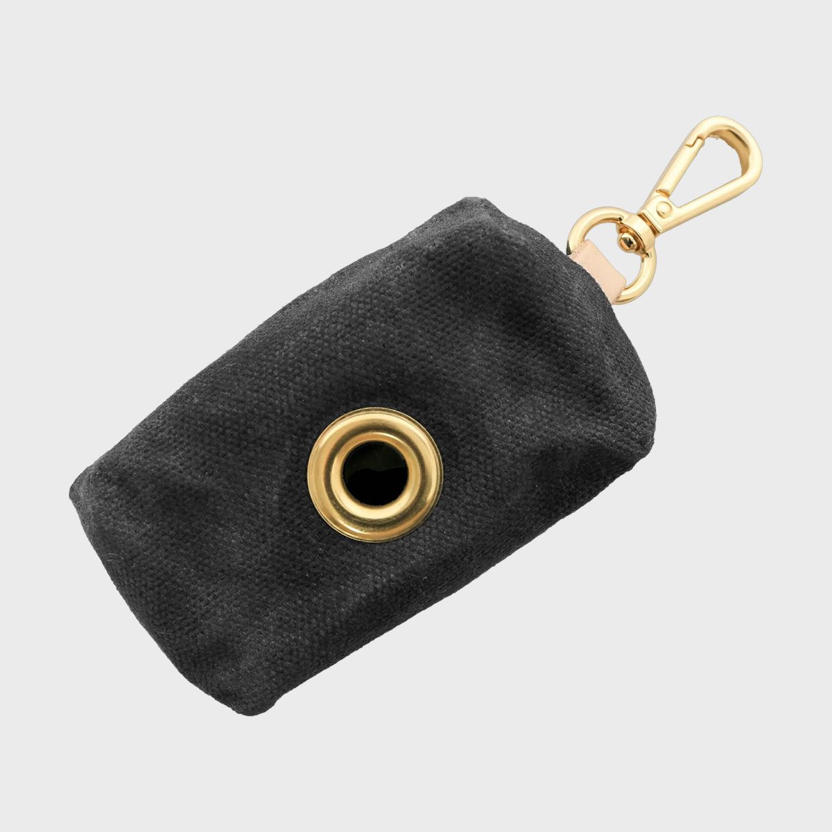 Black fabric pouch with a metal grommet and carabiner clip, positioned against a plain light background.