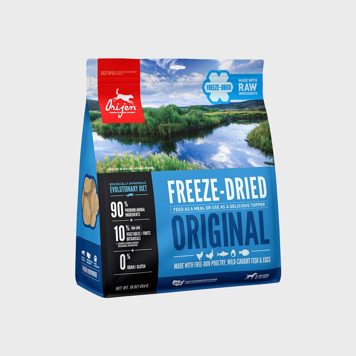 Bag displays "Orijen Freeze-Dried Original" food with nature landscape, highlights ingredients and nutritional details; emphasizes quality and natural sourcing.