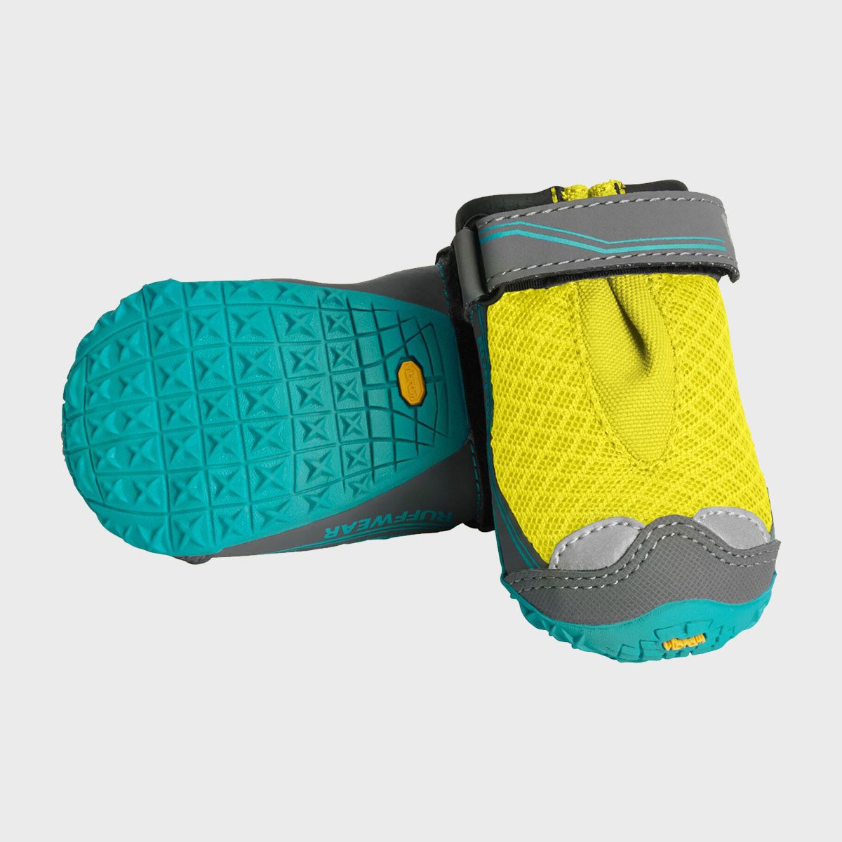 Bright yellow dog boots with teal soles resting on a white background, featuring a textured pattern and adjustable straps for secure fit.