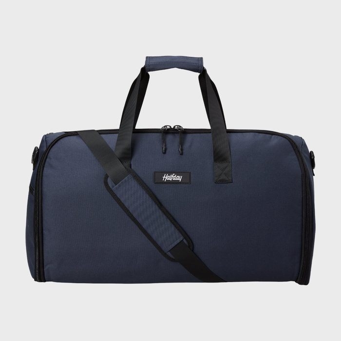 A navy blue duffel bag with black straps is displayed against a white background, featuring 