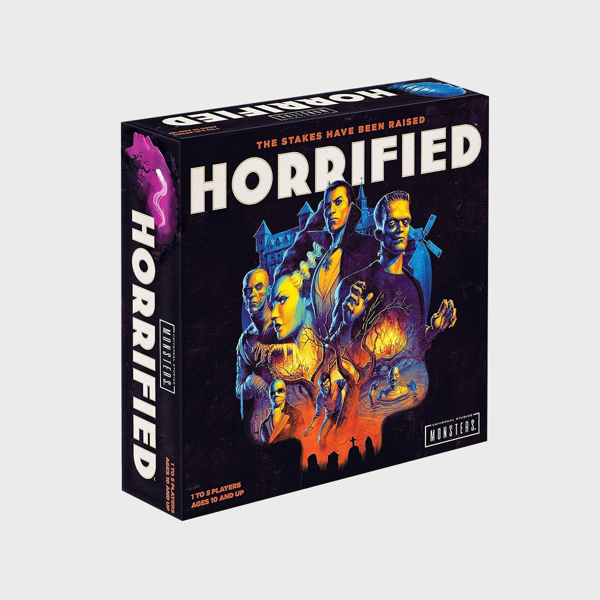 Box displays "Horrified" title with classic monsters gathered ominously, set against a dark background, featuring a haunted house and windmill silhouette.