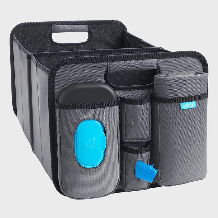 A gray storage organizer stands open with various compartments, featuring a mounted blue container. It's designed for car use, adding convenience for traveling.