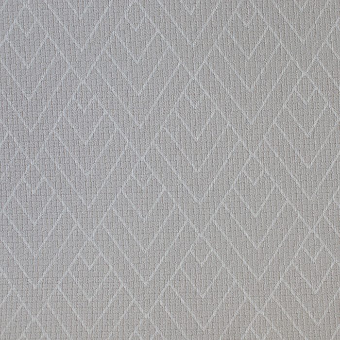 Geometric pattern forms intersecting lines, creating diamond shapes on a textured, light grey surface.