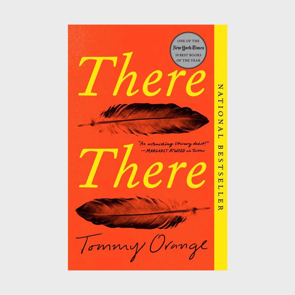 Book cover features two feathers on an orange background, titled "There There" by Tommy Orange, with a National Bestseller label.