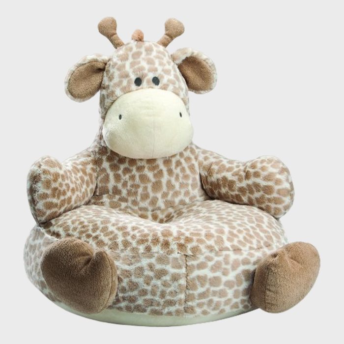 Plush chair features a giraffe design with a smiling face and soft, spotted fabric. It rests on a plain white background.