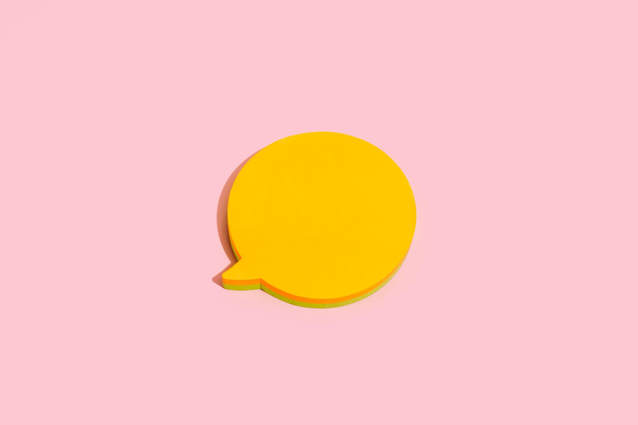 Orange Blue Blank Note In The Shape Of Comic Bubbles On Pink Background