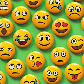 Yellow emoji faces display various expressions, including happy, sad, and surprised, scattered on a bright green background.