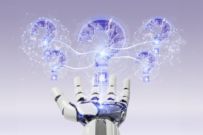 AI robot hand with questions