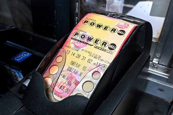 powerball ticket being printed by machine in Florida