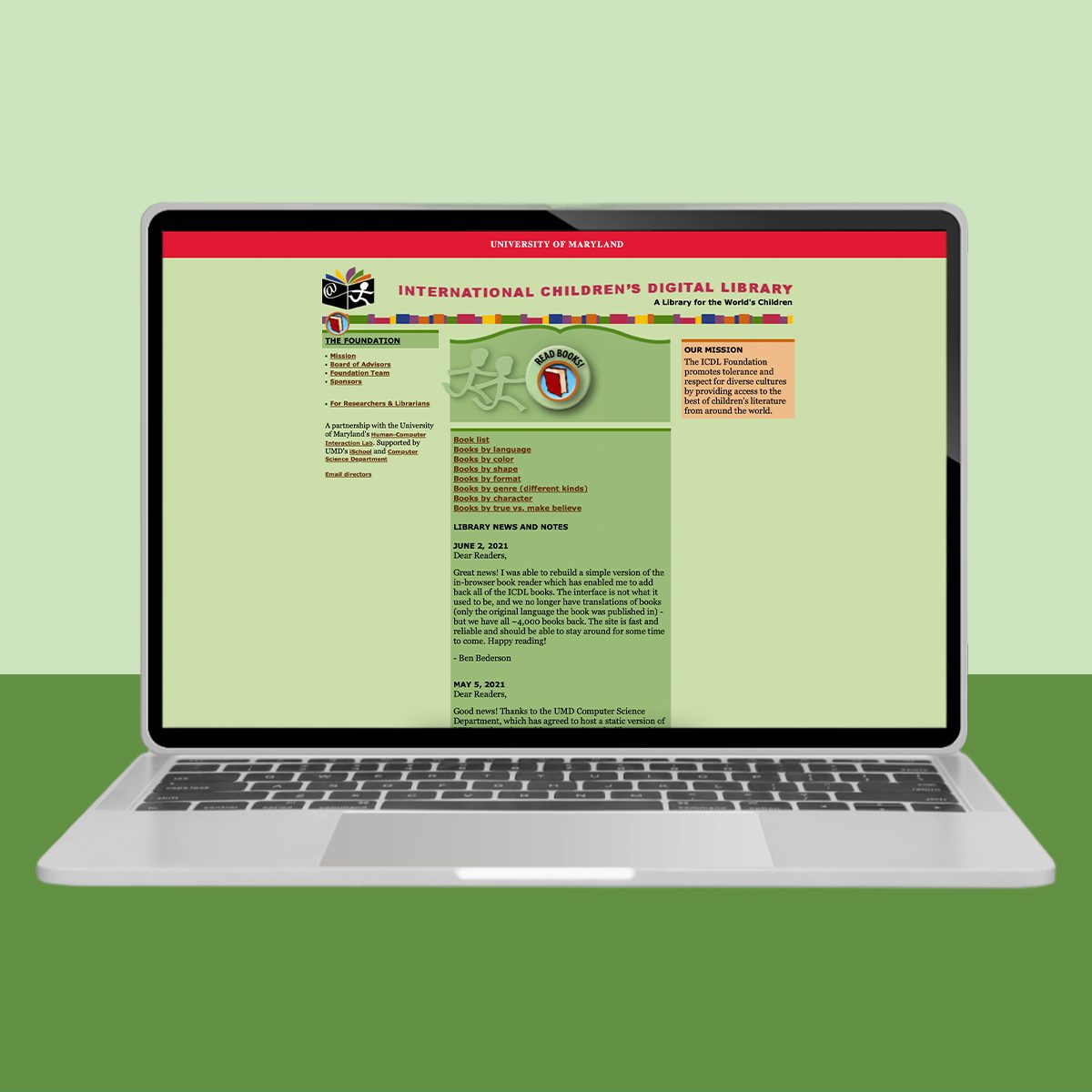 A laptop displays a webpage titled "International Children's Digital Library" featuring a book list and note sections, on a green background.