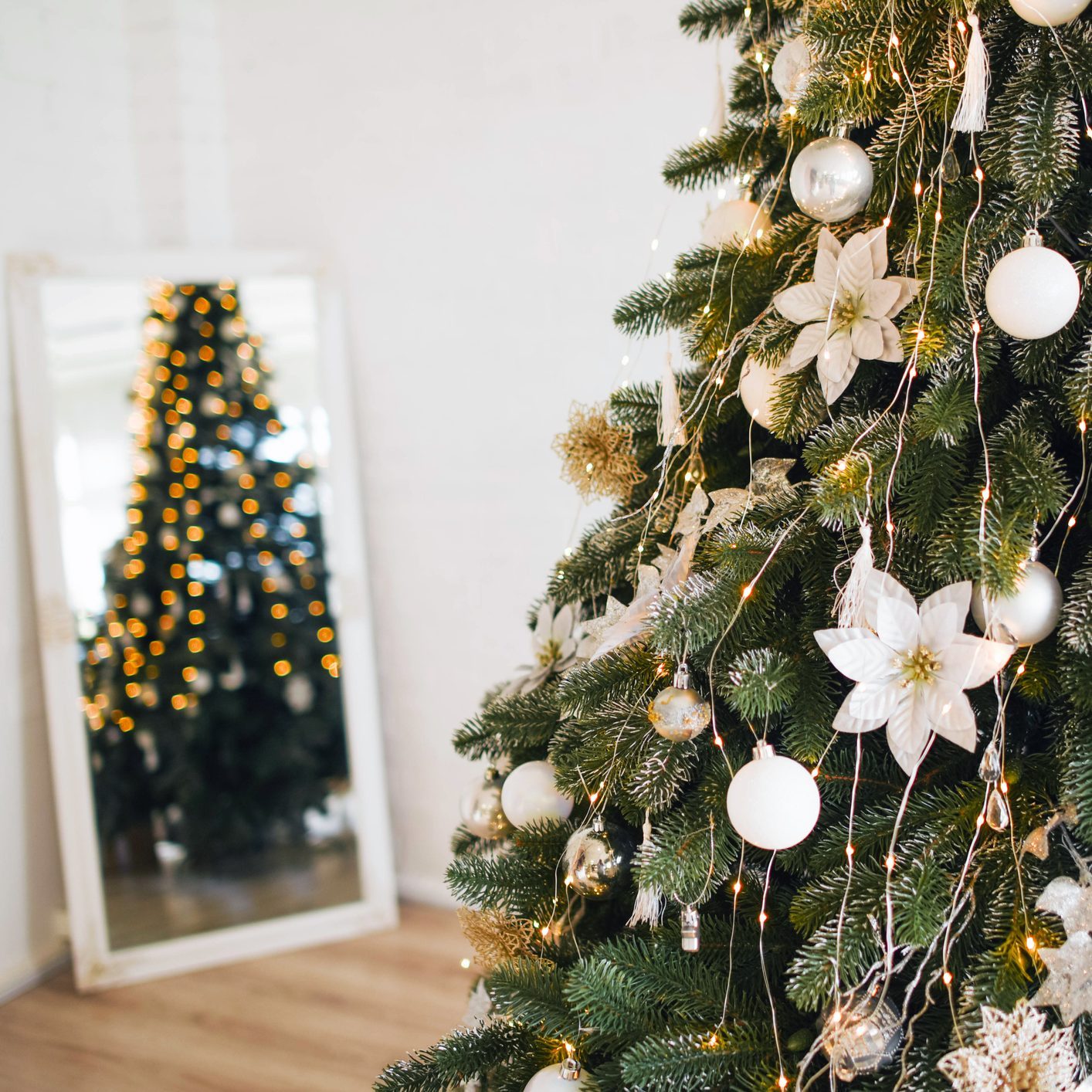 The Christmas tree is decorated with beautiful toys.