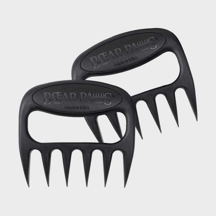 Claw-shaped black handles lay overlapping, displaying 