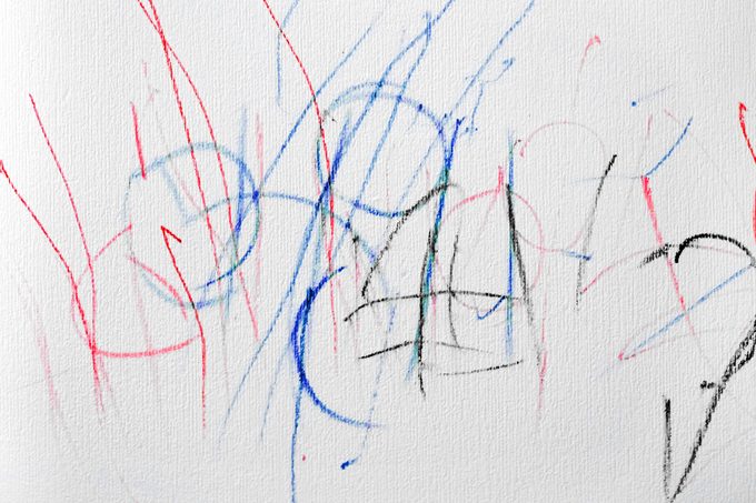 kid permanent marker scribbles on wall