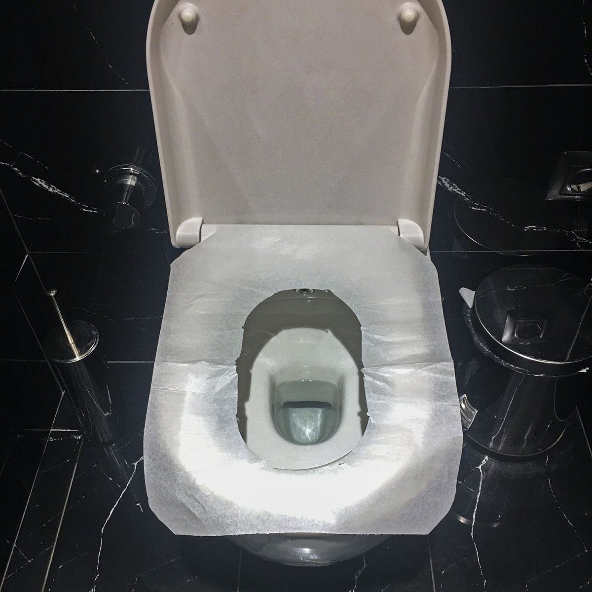 The Right Way to Use a Toilet Seat Cover (Yep, You’ve Been Doing It Wrong)