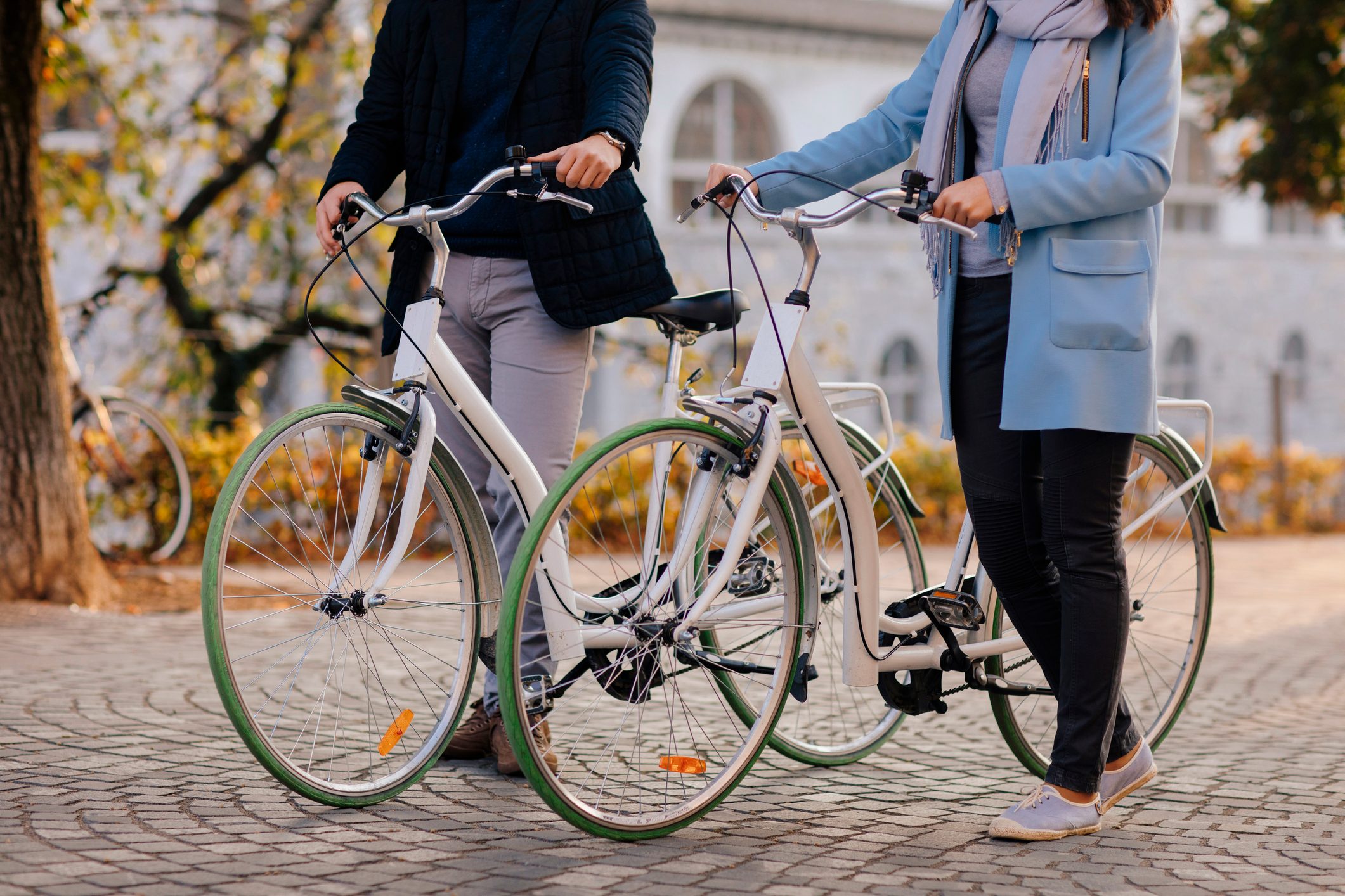 Couple Riding Bicycles In Autumn