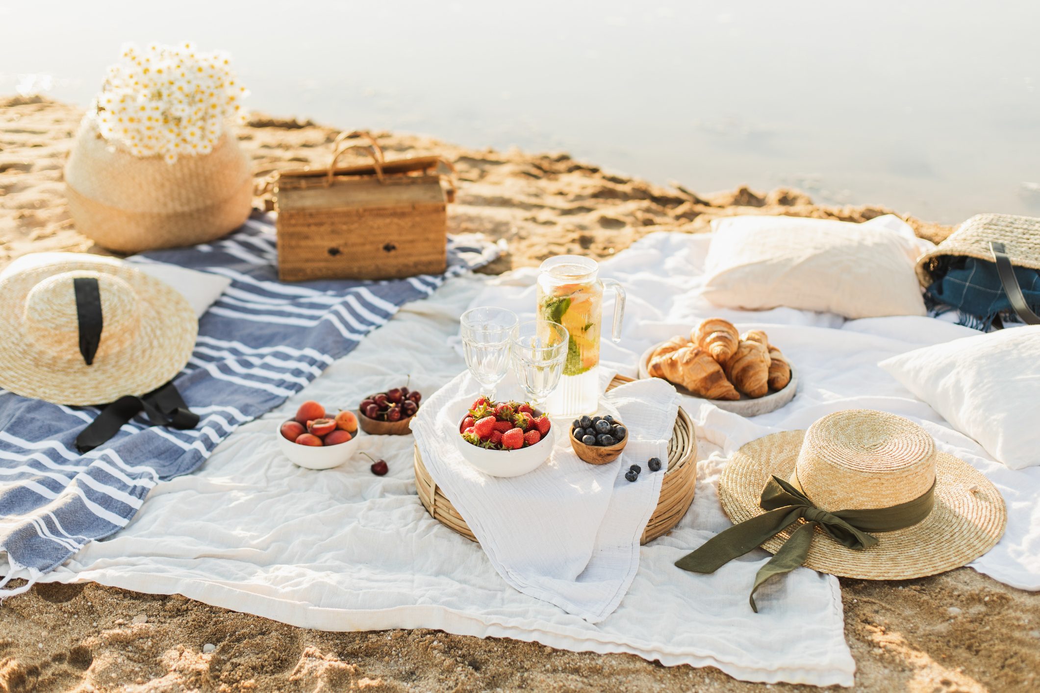 Beautiful celebration picnic outdoor with tasty food and lemonde.