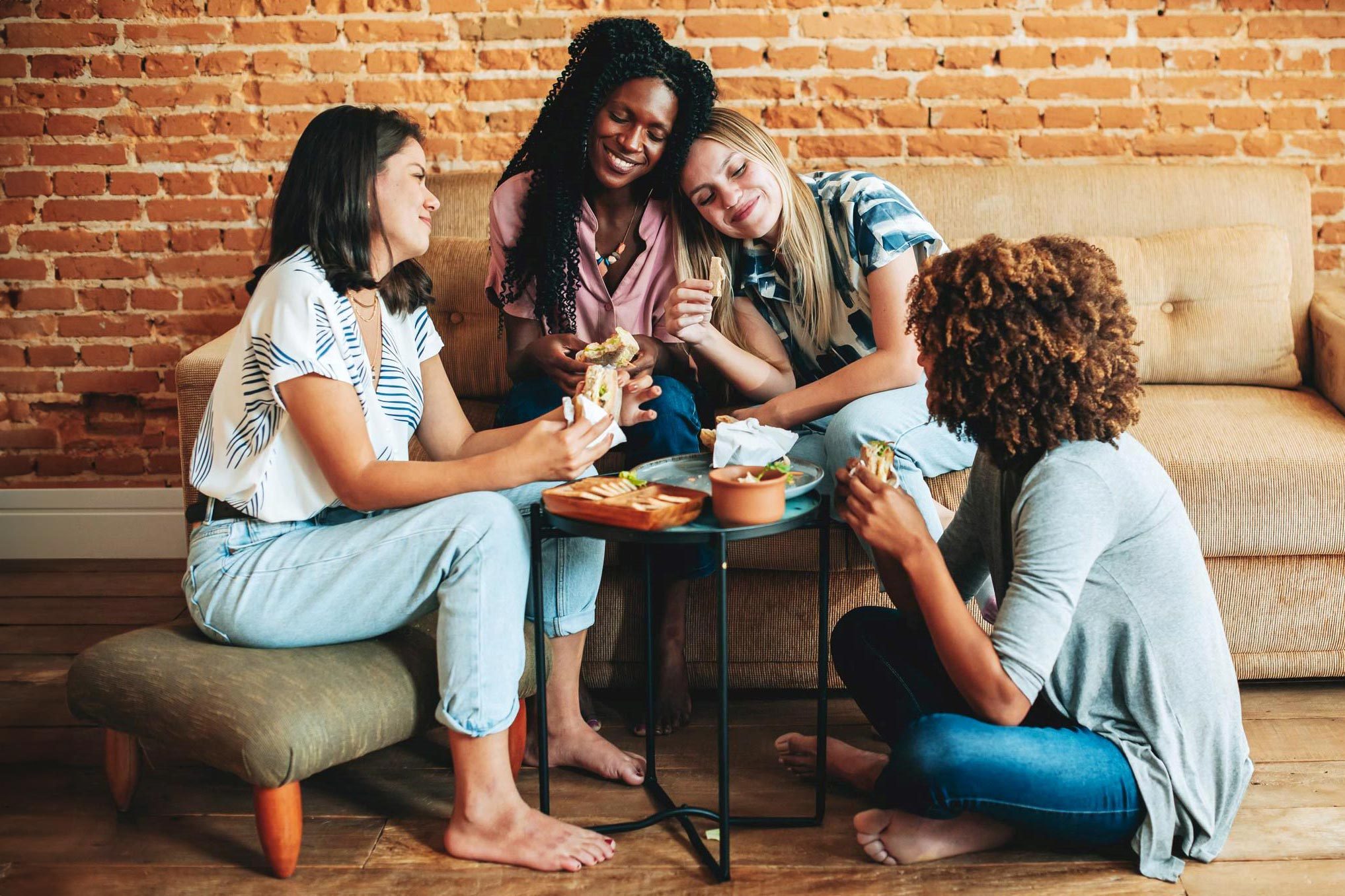 friends celebrating galentine day with brunch at home
