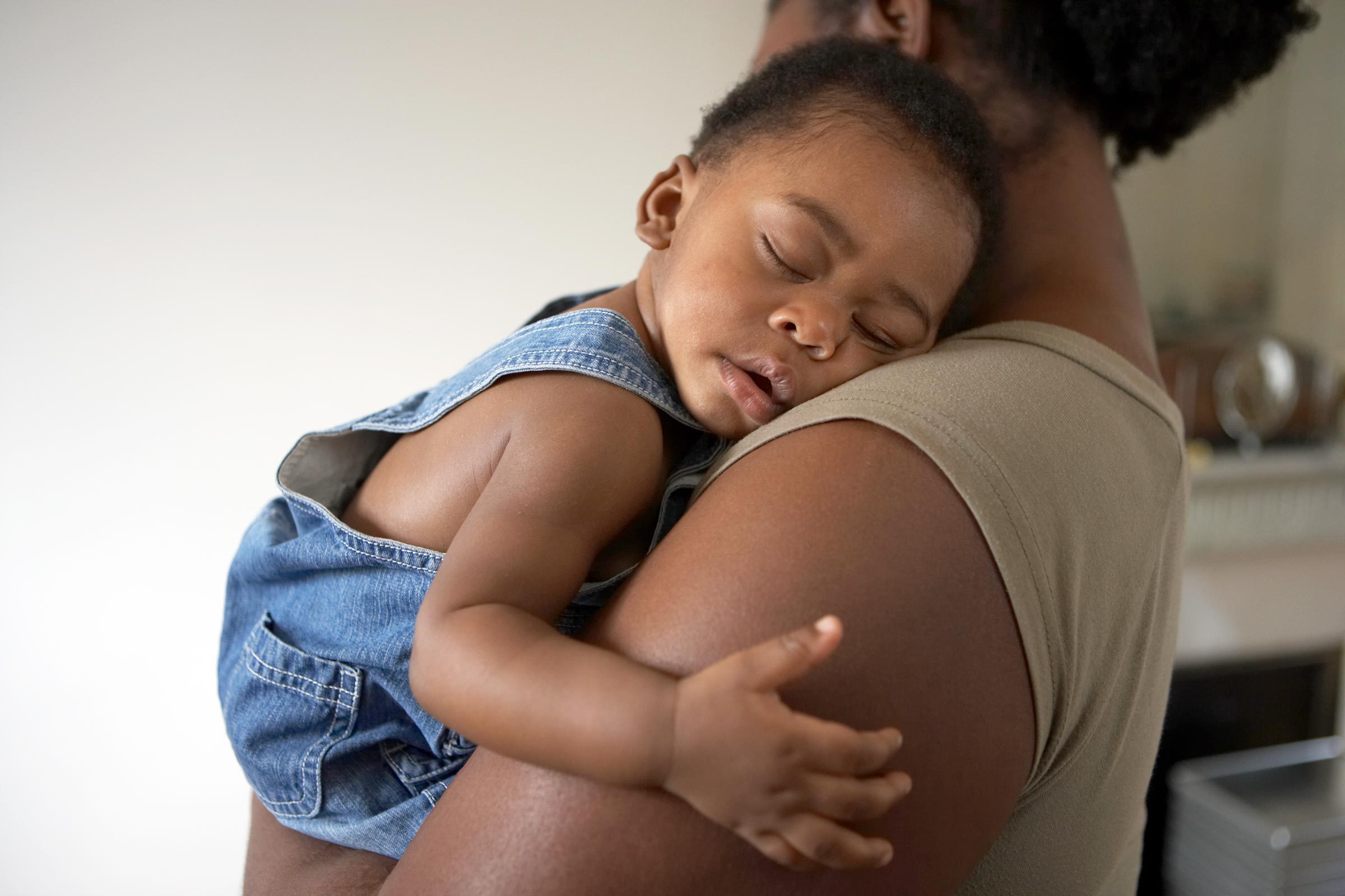 sleeping baby and mother