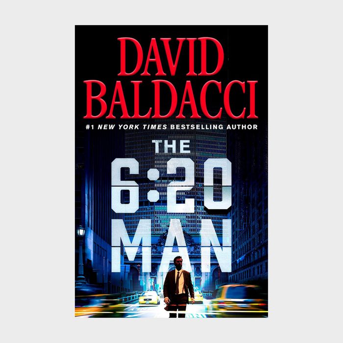 Book cover shows a suited man walking, city street backdrop, with text: 
