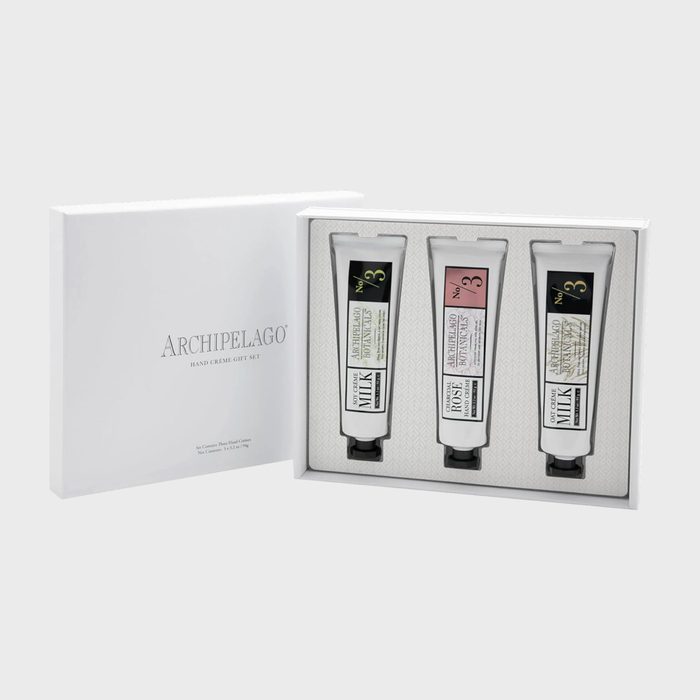 Gift set contains three hand cream tubes in a white box. Text reads, 