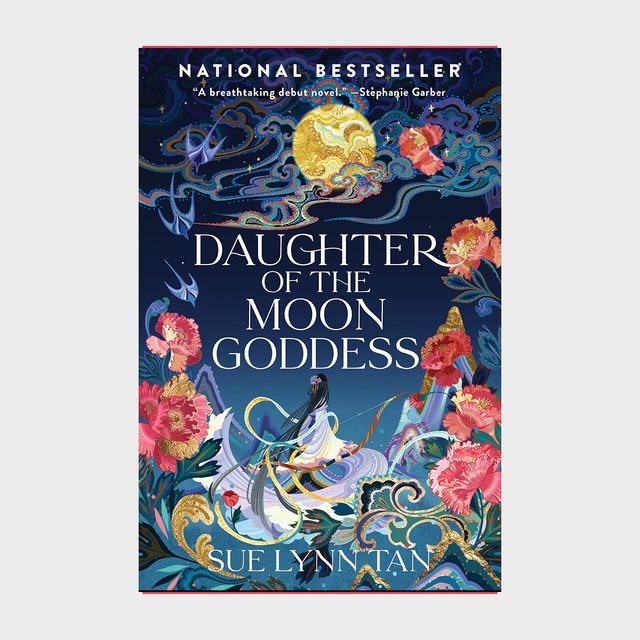 Book cover features an elegant figure in flowing robes surrounded by celestial patterns, floral motifs, and a glowing moon. Text: 