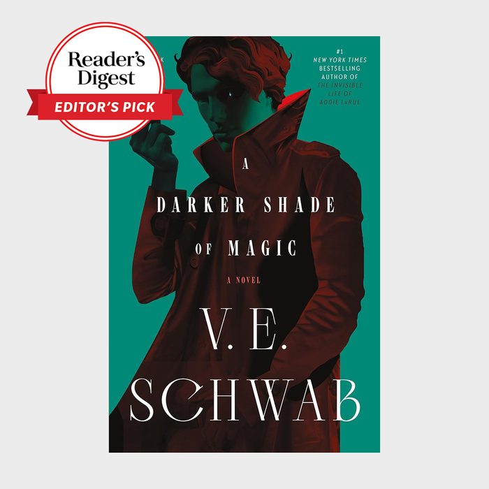 A shadowy figure adjusts a collar on a book cover, titled 