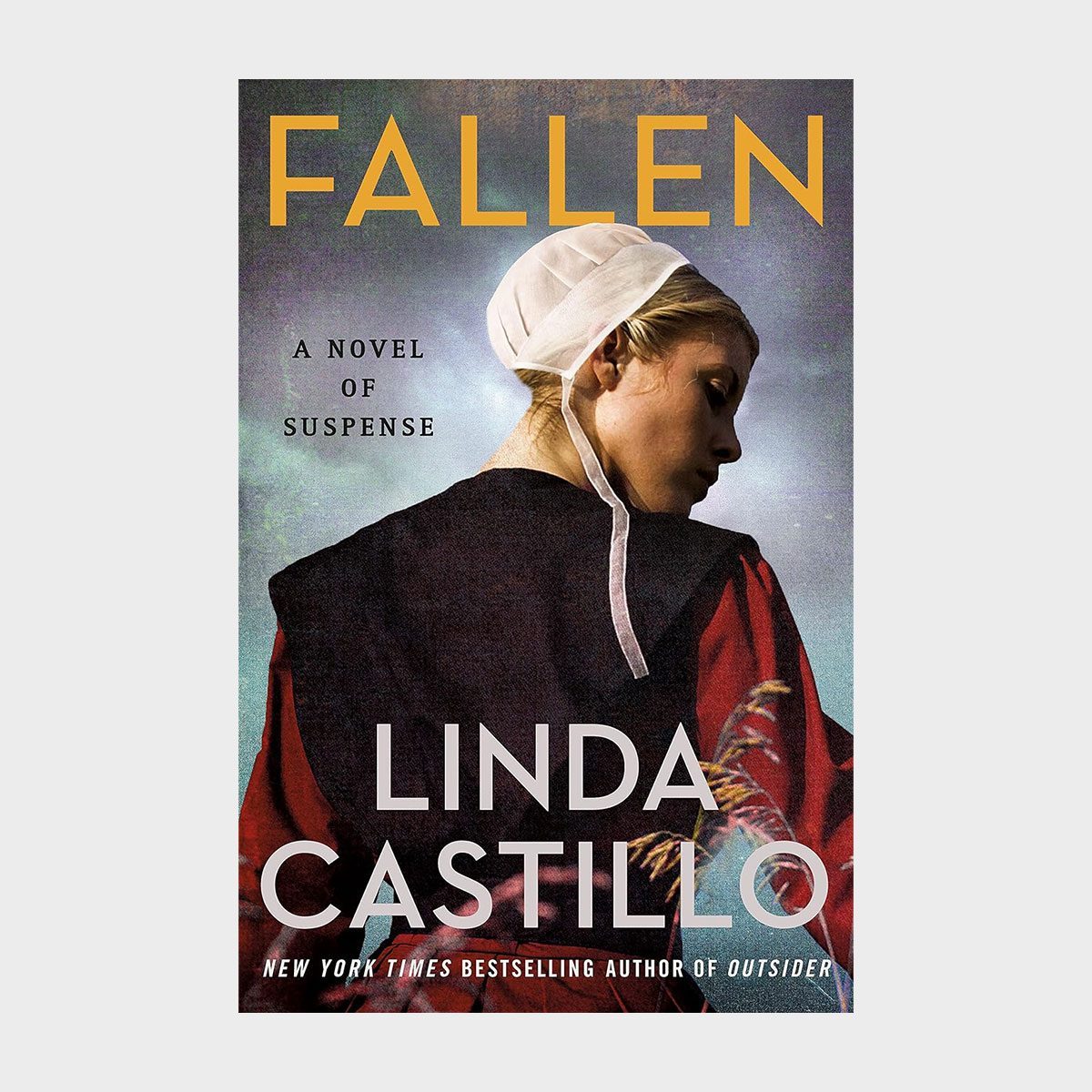 A woman in traditional attire looks downward; book cover text: "Fallen" by Linda Castillo. Atmosphere hints at mystery or suspense.