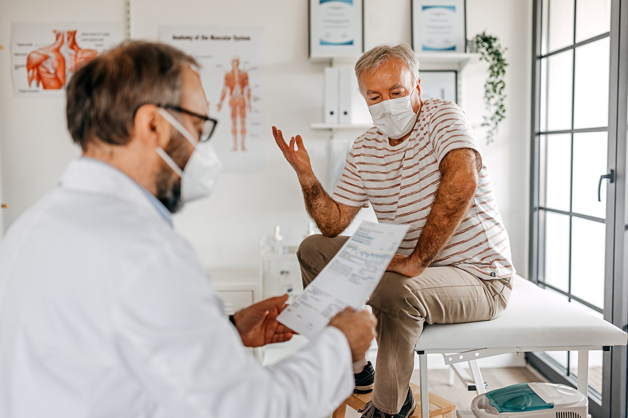 The patient explains the health problems to the doctor