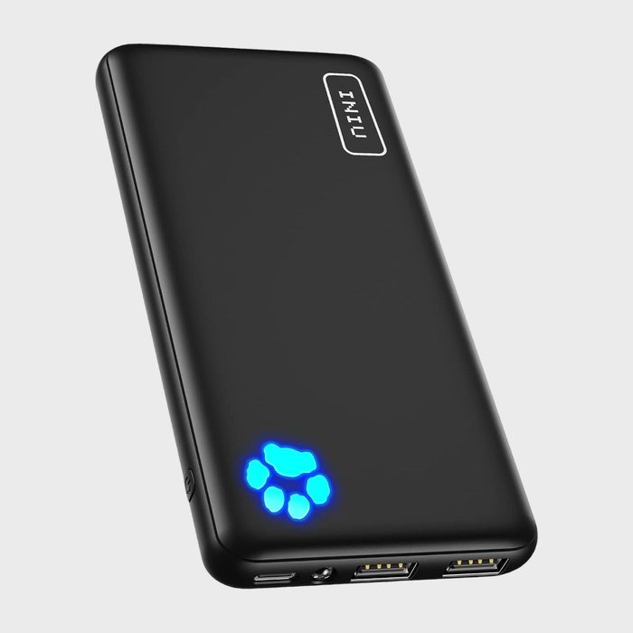 Black power bank displaying blue glowing paw print, featuring dual USB ports and brand text 