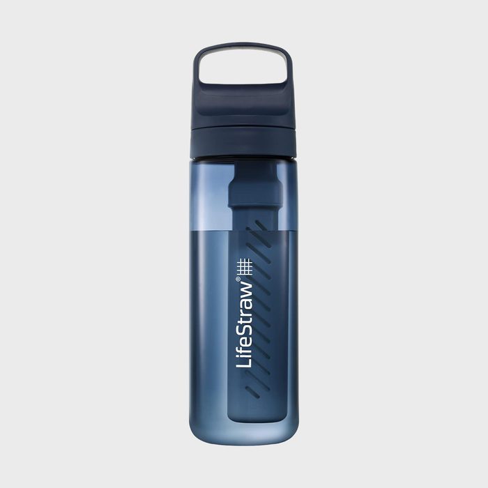 Bottle stands vertically, featuring a built-in filter and dark blue cap, labeled 