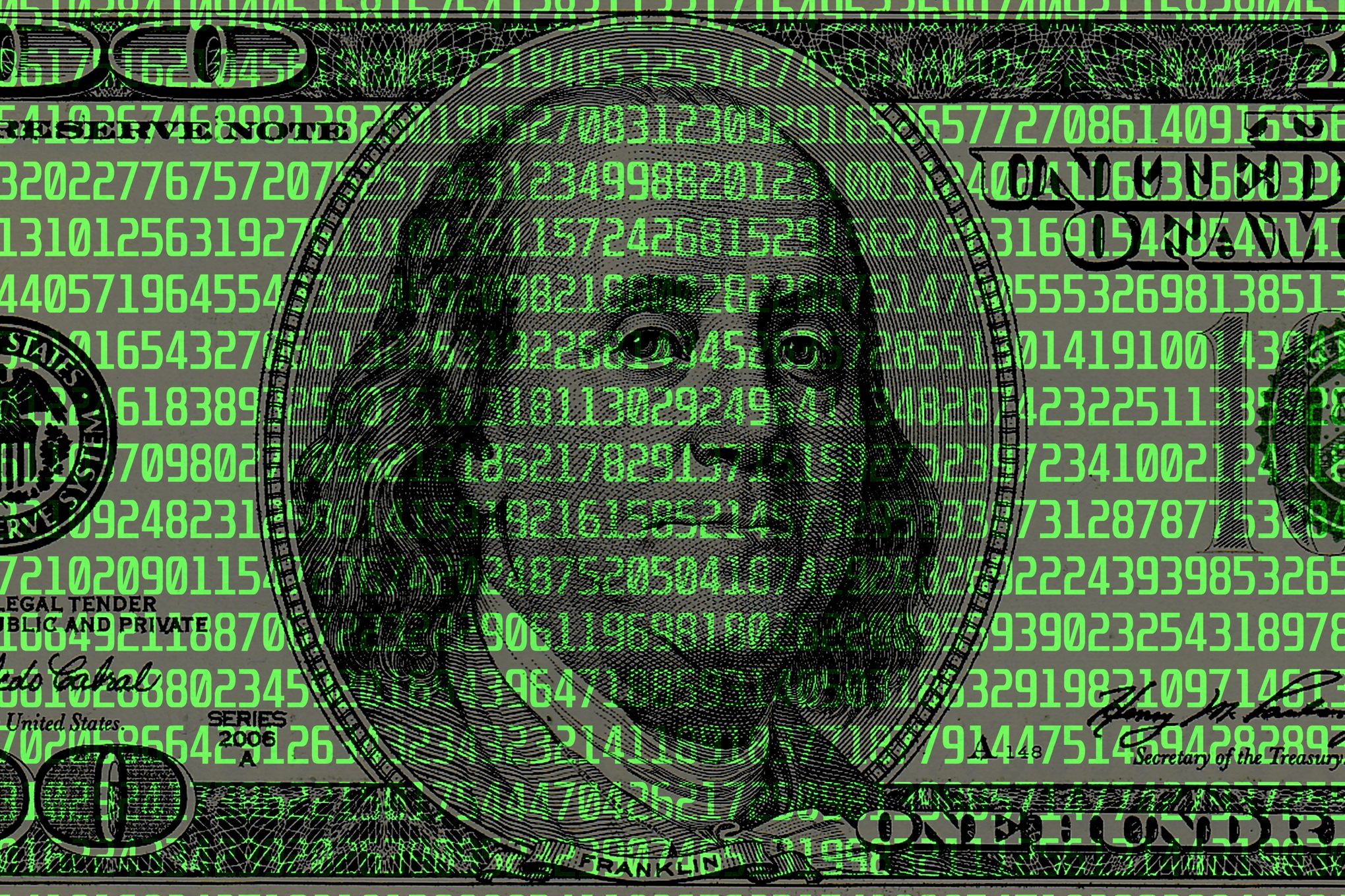 A hundred-dollar bill overlayed with green binary numbers; Benjamin Franklin's face partially visible behind the digital pattern.