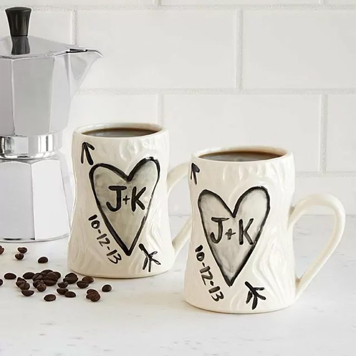 Two mugs with heart designs and 