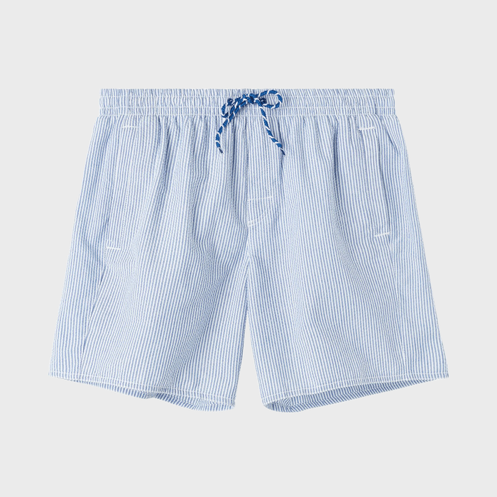Blue and white striped shorts with a drawstring waistband, spread on a plain white background.
