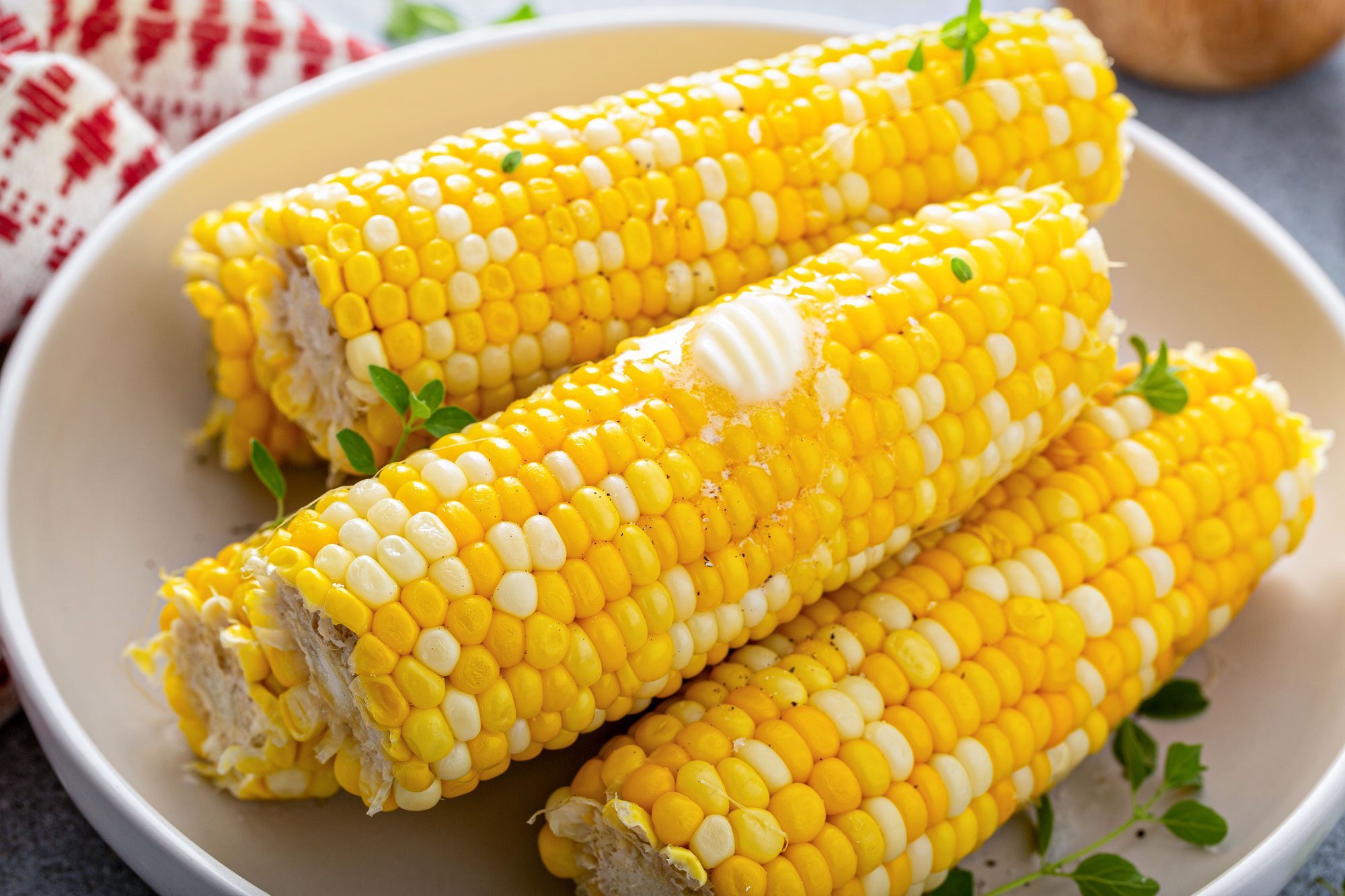 Cooked Corn On The Cob Served With Salt And Butter