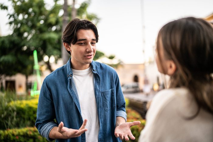 Young couple having an argument outdoors
