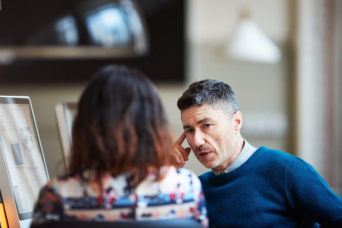 Two business colleagues discussing a project