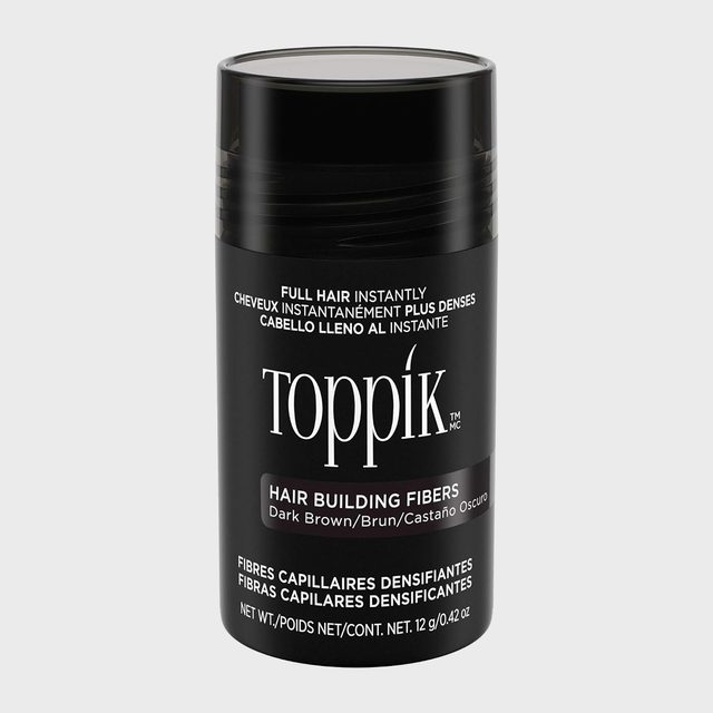 A black cylindrical container displays 