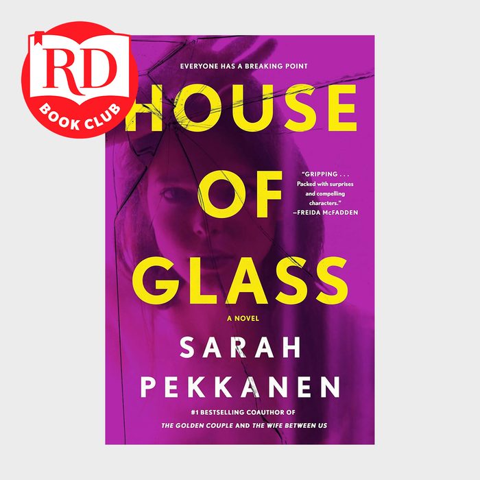 Book cover features shattered glass effect over a woman's face, with bold yellow text on a purple background: 