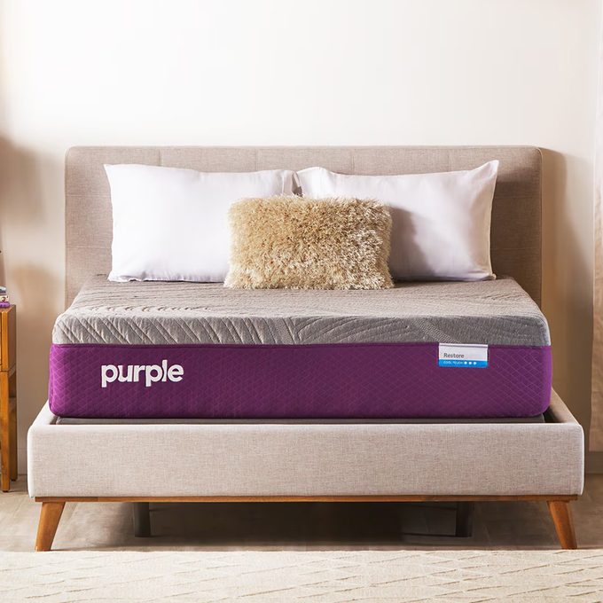 Mattress rests on beige bed platform; labeled 