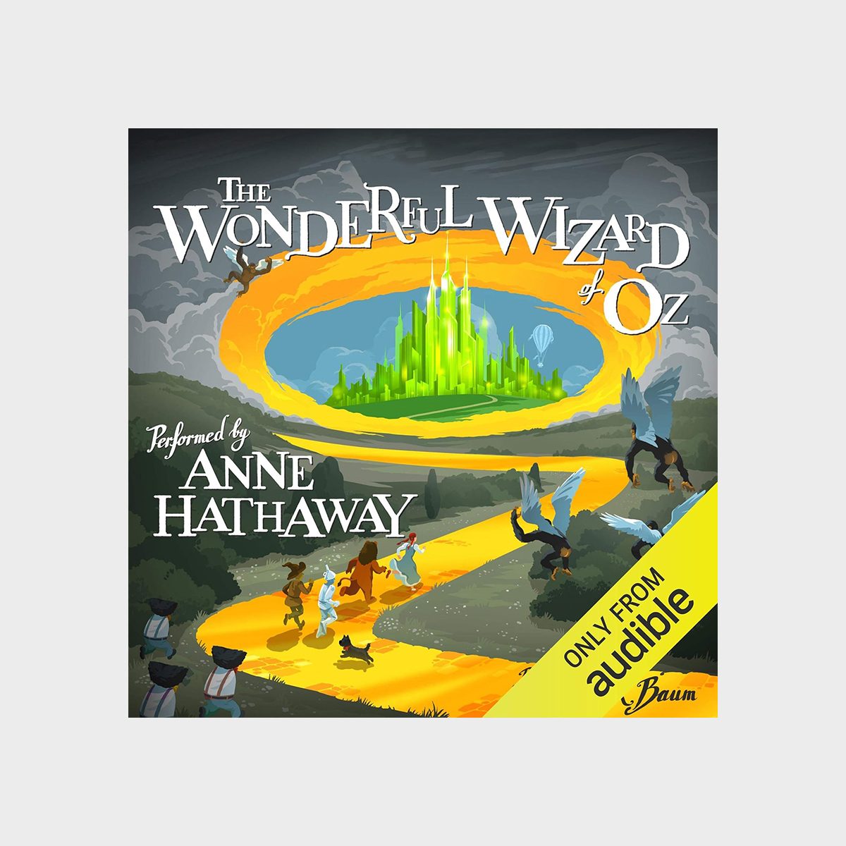 Emerald city shines ahead as four figures and a dog walk on a yellow brick path; text: "The Wonderful Wizard of Oz," "Performed by Anne Hathaway."