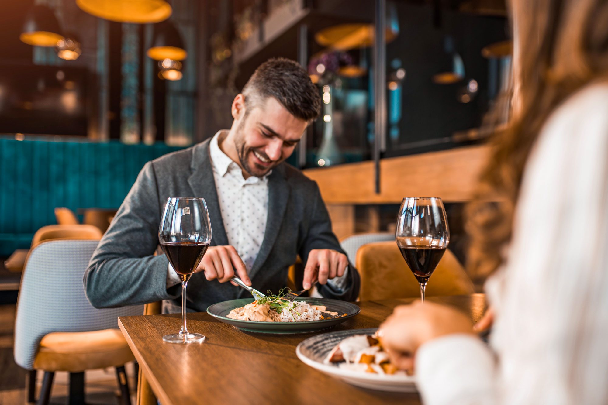 Elegant Man Eating Lunch In A Restaurant