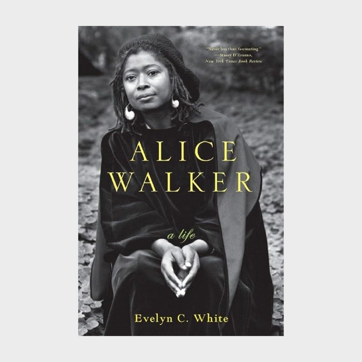 The black-and-white book cover shows a woman sitting outdoors, with the title "ALICE WALKER: a life" by Evelyn C. White.