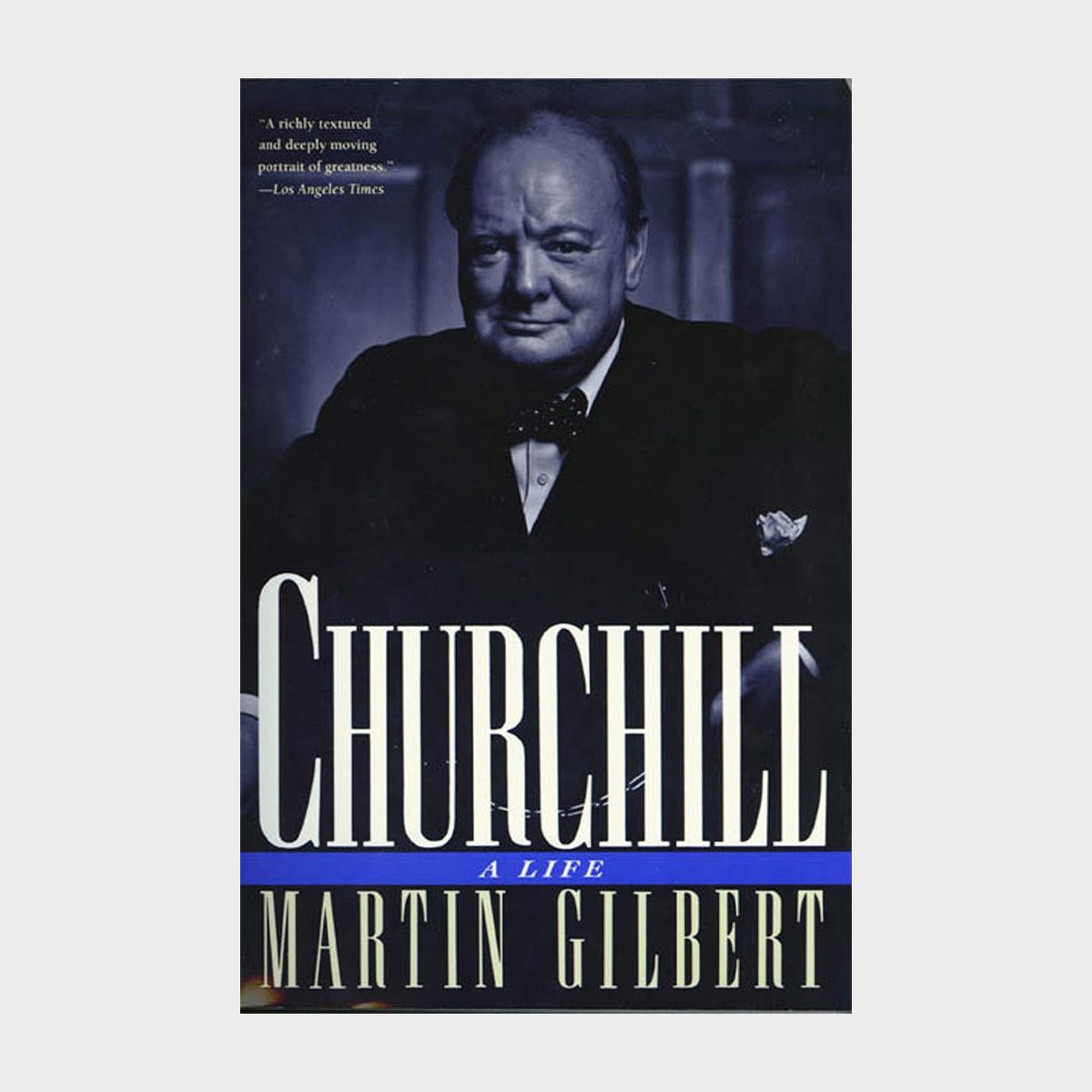 A book cover shows a formal portrait of a man in a suit. Text reads: "Churchill: A Life," by Martin Gilbert.