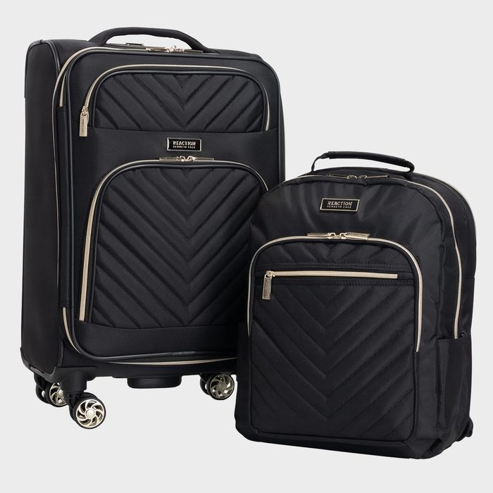 Black luggage set features a rolling suitcase and backpack with chevron patterns, displayed on a plain backdrop. Text: 