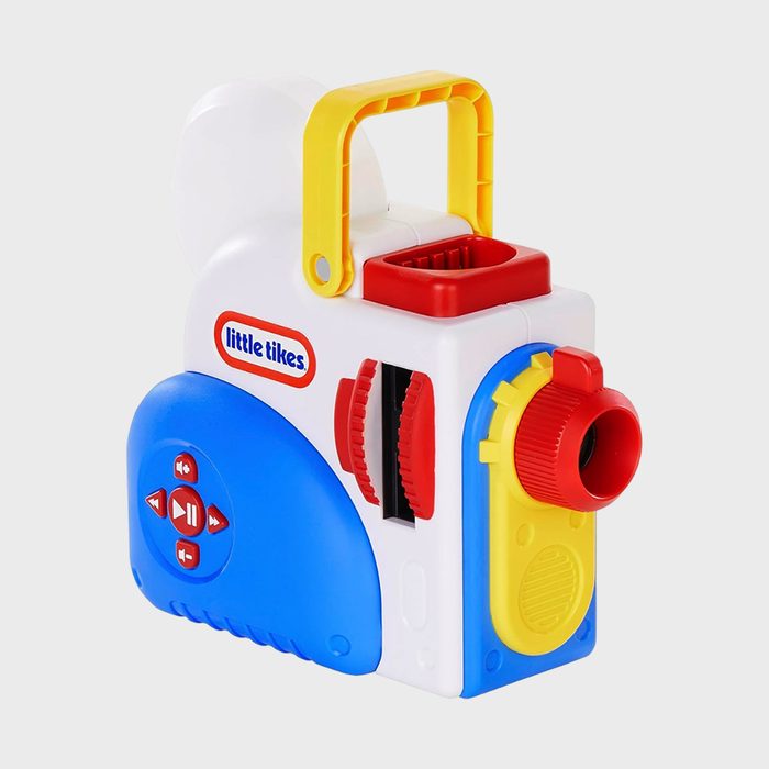 Toy projector showing colorful buttons and knobs; white, blue, red, and yellow design; labeled 